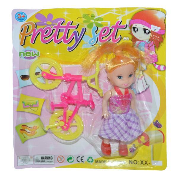 Papusa mica cu bicicleta